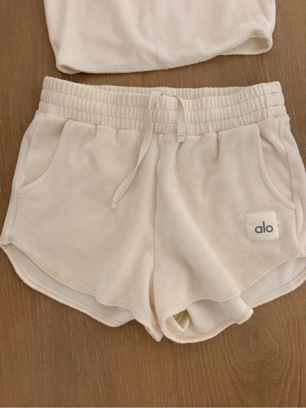 Alo Terry Shorts and Cropped Top Set in cream color